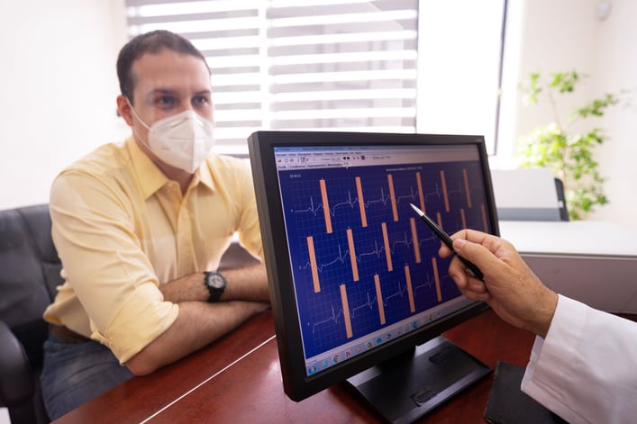 A patient receiving test results